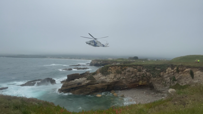 O helicóptero na zona do accidente