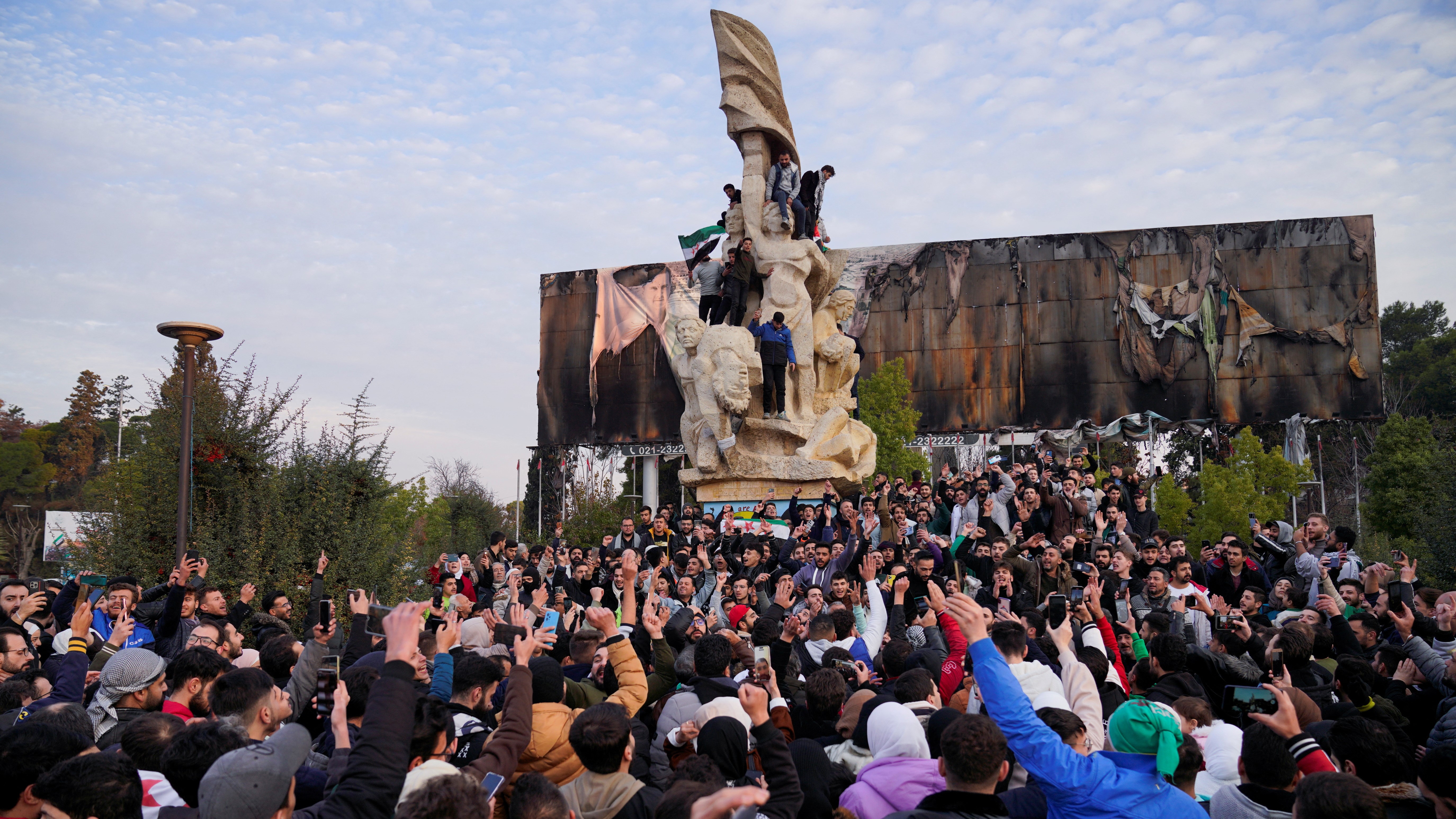 Celebración en Alepo tras a toma de Damasco. REUTERS/Karam al-Masri